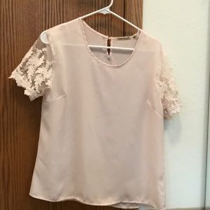 Light pink sheer and lacy blouse